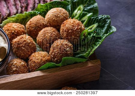 Falafel Balls On A Romano Leafs In A Wooden Box.