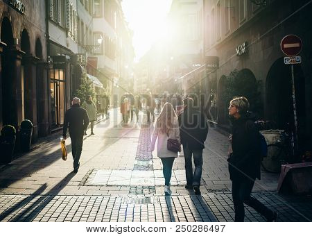 Strasbourg, France - Oct 28, 2017: Majestic Sunlight Over Large Crowd And Long Shadows Of People On 