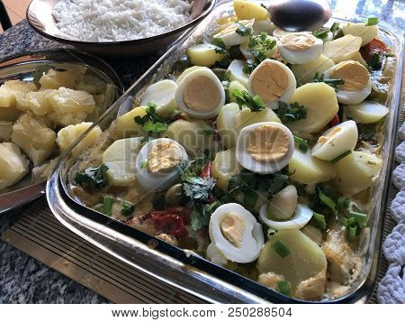 Cod with eggs olives and vegetables