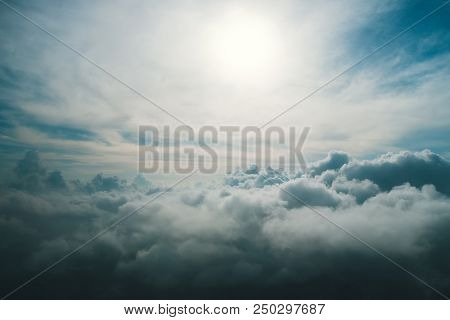 A View From High Above The Clouds. View Of The Clouds From The Window Of The Aircraft. Non-flying We