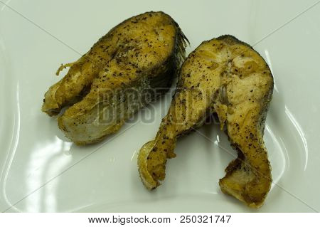 Two Pieces Deep Fried Of Indo-pacific King Mackerels Fish Very Yummy