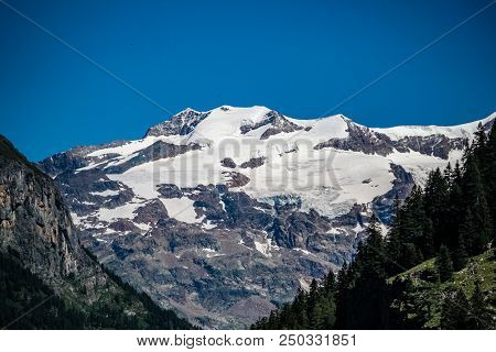 Panoramic View Of An Alpine Valley