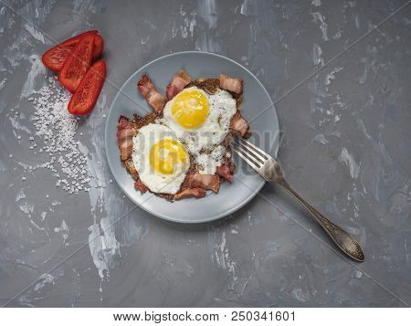Fried Eggs From Two Eggs With Fried Bacon And Red Pepper, Cupronickel Plug