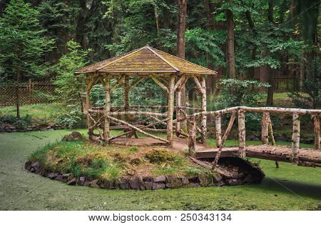 Rustical Gazebo At Vysoka, Antonin Dvorak Memorial Park In Middle Of Small Lake