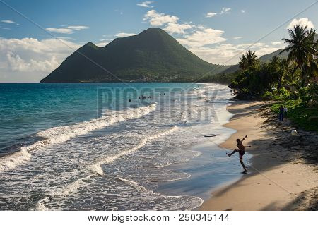 Le Diamant, Martinique, France - 20 July 2017: Le Diamant Beach In Martinique, With Young Man Playin
