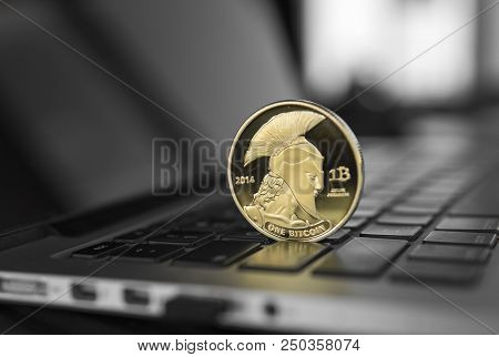 Titan Bitcoin Coin Symbol On Laptop. Concept Financial Currency, Crypto Currency Sign. Blockchain Mi