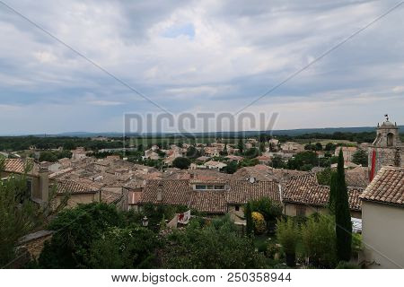 Grignan, France - July 16, 2018: Photography Showing A The Village Of Grignan And Its Surrounding Ar