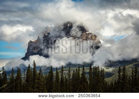 Clouds And Morning Fog Around The Castle Mountain, Alberta, Canada