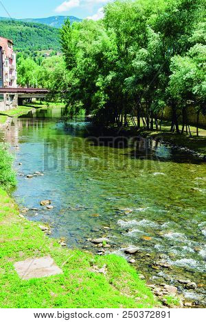 Buildings Facing The River In The Town Of Ripoll In Catalonia.