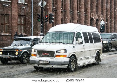 Saint Petersburg, Russia - February 9, 2011: Motor Car Gmc Savana In The City Street.