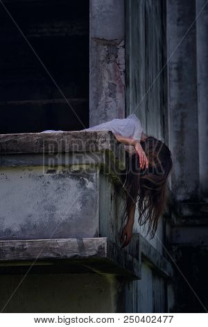 Zombie Ghost Woman Murder Underhung Head On Abandoned Building With Bloody ,halloween Concept