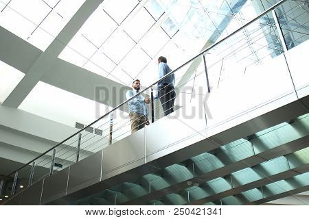 Bottom View. Business People Shaking Hands, Finishing Up A Meeting