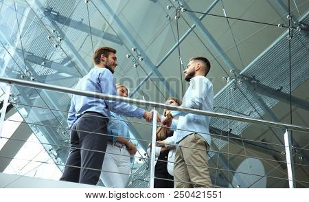 Bottom View. Business People Shaking Hands, Finishing Up A Meeting