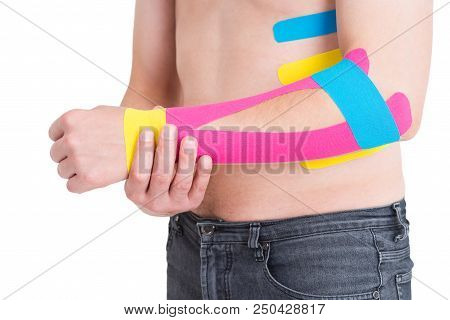 Kinesiology Taping On Human Hand, Isolated On White Background