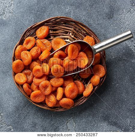 Dried Apricots On Gray Background. Top View.