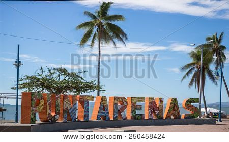 Downtown Puntarenas, Costa Rica.
View Over The Shore Of The Port Of Puntarenas, And The Touristic Si