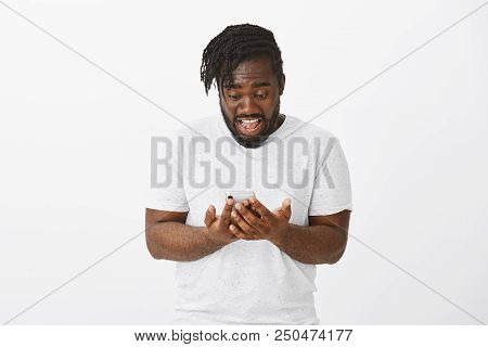 No Way, Look At This Awesome Smartphone. Portrait Of Excited Good-looking African-american Boyfriend