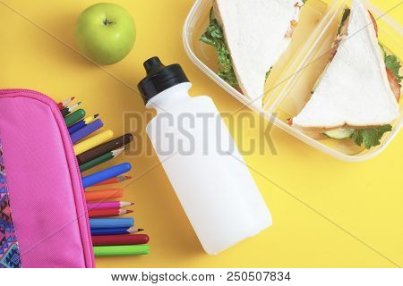 School Lunch Sandwich And Green Apple, Bottle Of Water, Healthy Eating Concept, Colorfu Encils Yello