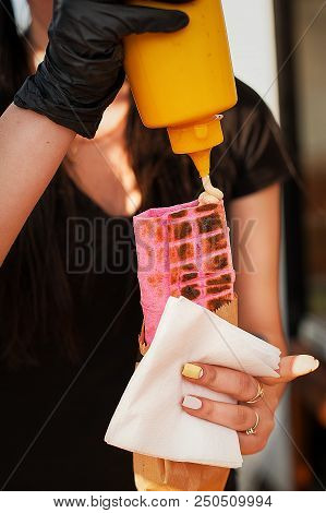 Preparation Of Shawarma. The Cook Pours Sauce. Street Food.