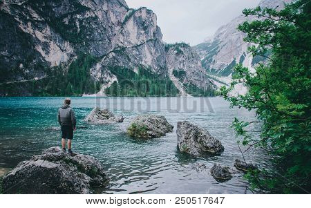 Hiker Enjoing Beautiful View Of Lago Di Braies Or Pragser Wildsee, Trentino Alto Adidge, Dolomites M
