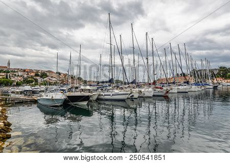 Vrsar, Croatia - May 22, 2018: View On Yacht, Harbor, Adriatic Sea And Small Croatian Town Vrsar, Cr