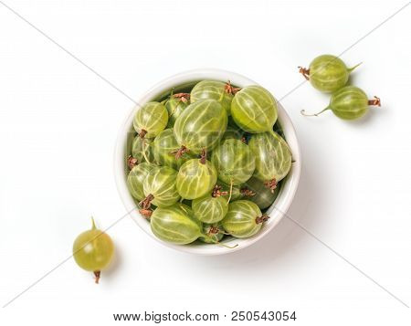 View From Above Of Ripe Green Gooseberry In Small Bowl On White Background. Organic Gooseberries Iso