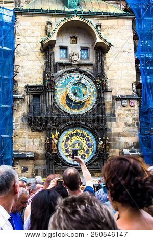 Prague, Czech Republic -july 23,2017: Back View Of Crowd Of Tourists Waiting For The Chiming Of The 
