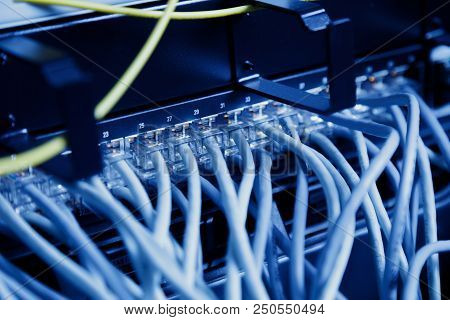 Modern High Tech Internet Data Center Room With Network Panel, Switch And Cable