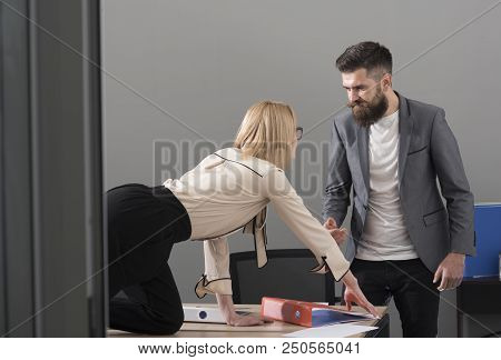 Business Woman Seduce Boss In Office. Business Woman On Desktop Look At Bearded Businessman, Sexual 