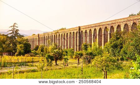 Sunny Evening At Nottolini Aqueduct Near Lucca, Tuscan, Italy.