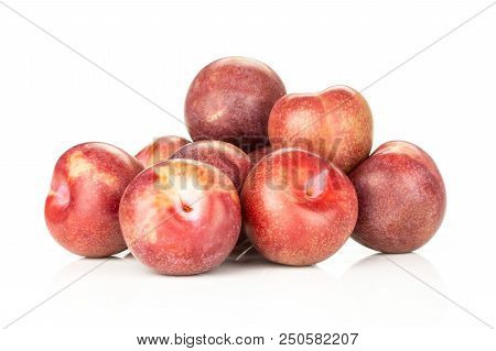 Lot Of Whole Fresh Pluot Interspecific Plums Variety Heap Isolated On White