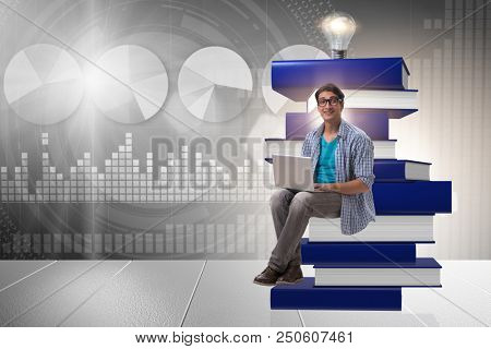 Young man in telelearning concept with laptop and books
