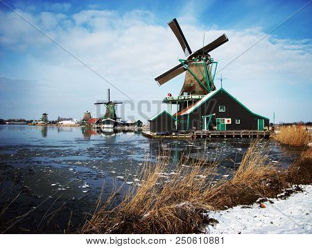 Winter Landscape With Windmills In Zaanse Schans Typical Village, Netherlands