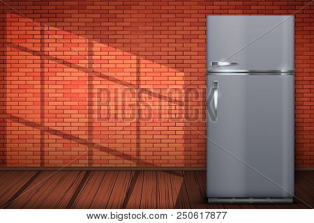 Laundry Room Interior With Modern Fridge Freezer On Red Brick Wall Background With Sun Light. The Co