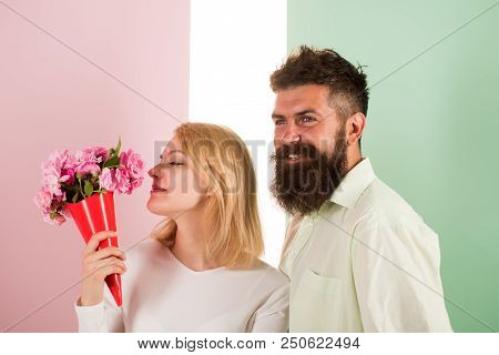 Woman Enjoy Fragrance Bouquet Flowers. Couple In Love Happy Celebrate Anniversary. Lady Likes Flower