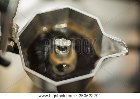 Traditional Italian Moka Machine With Fresh Hot Coffee Coming Up.