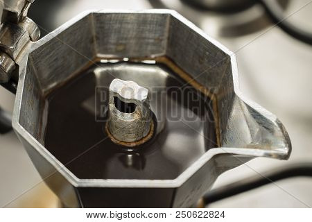 Traditional Italian Moka Machine With Fresh Hot Coffee Coming Up.