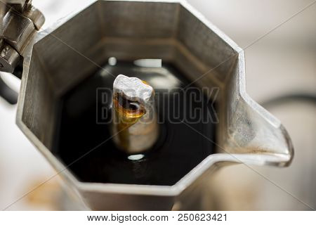 Traditional Italian Moka Machine With Fresh Hot Coffee Coming Up.