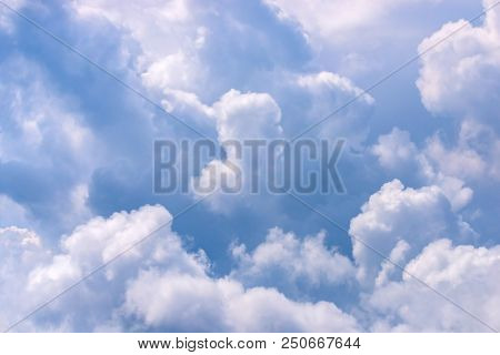Blue Sky And Big White Clouds Background.