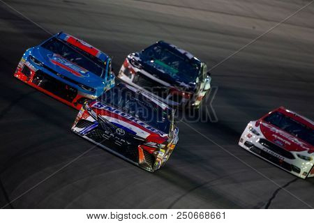 July 15, 2018 - Sparta, Kentucky, USA: Kyle Busch (18) races off the turn during the Quaker State 400 at Kentucky Speedway in Sparta, Kentucky.
