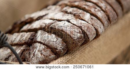 Sliced Rye Bread In A Basket On A Napkin