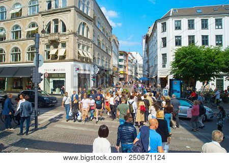 Copenhagen, Denmark - June 14, 2018: People Crossing The Road At Copenhagen Central Shopping Street.