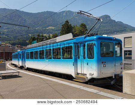 Arth, Switzerland - July 19, 2018: A Train At A Platform Of The Arth-rigi-bahn Railway Station. Arth