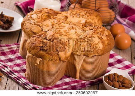 Easter Dove Bread (colomba Pasquale) On Wooden Table.