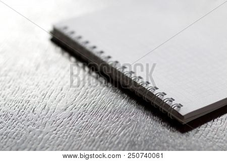 Notebook Paper Top View On Wooden Table. White Blank Notebook Paper Opened For Message On Woood Desk