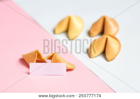 Fortune Cookie On Pink And Blue Background, Pastel Colors, Copy Space For Prediction