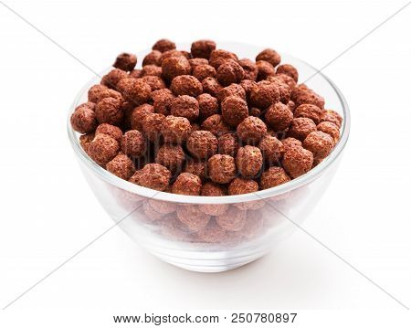 Glass Bowl Full Of Chocolate Balls Isolated On White Background