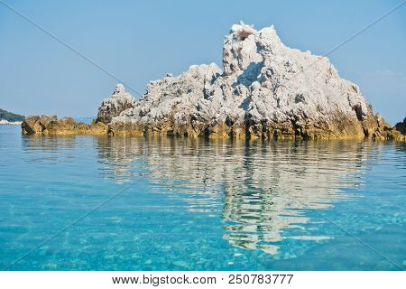 Sea Rocks At Calm And Crystal Clear Turquoise Water At Morning, Milia Beach, Island Of Skopelos, Gre