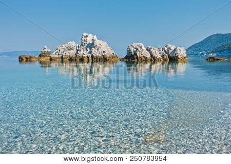 Sea Rocks At Calm And Crystal Clear Turquoise Water At Morning, Milia Beach, Island Of Skopelos, Gre