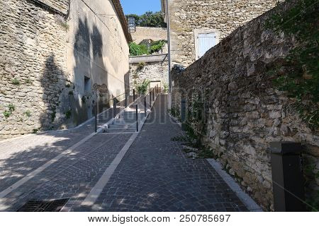 Grignan, France - July 17, 2018: Photography Showing Some Street And Buildings. The Photography Was 